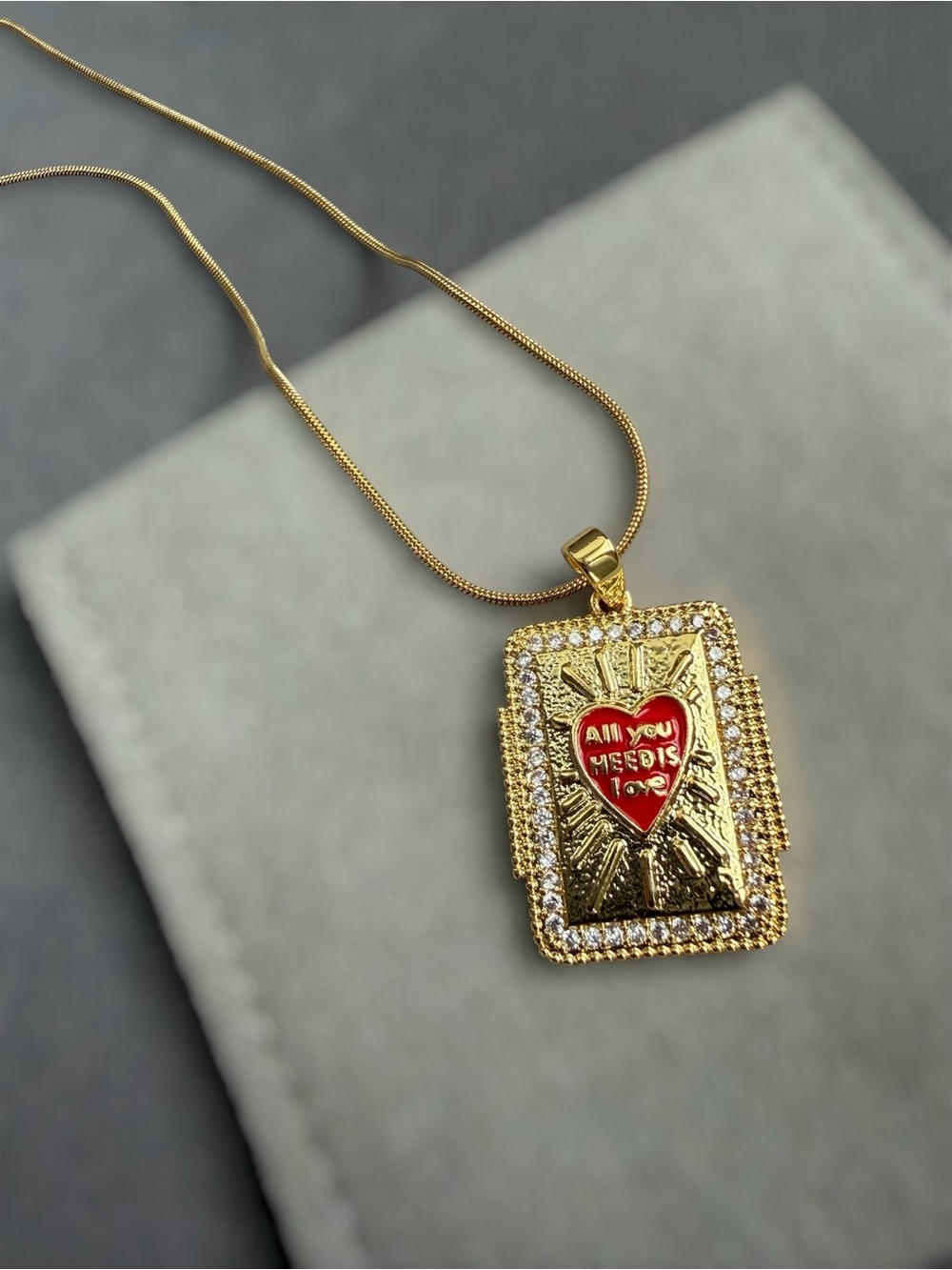 Gold-Tone Heart Pendant Necklace with Red Enamel Accent